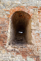 old castle brick wall with window