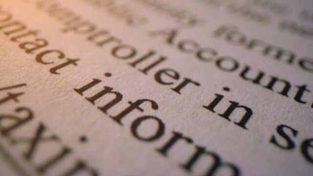 Extreme Macro Legal Text on Paper. view moves down the page on random legal text in extreme close up