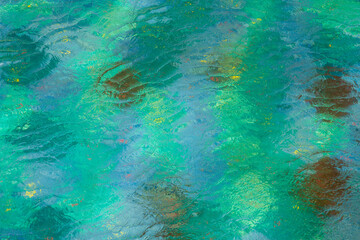 Fototapeta na wymiar Abstract background - water ripples similar to multicolored glass
