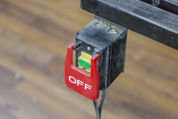 Electrical switch with buttons for turning off and on the machine and industrial equipment