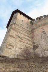 old castle tower with cracks