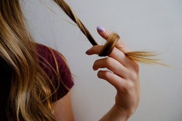 Woman twirling her hair