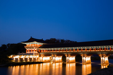 Fototapeta na wymiar Night view of Woljeonggyo traditional bridge on river in Gyeongju, Korea
