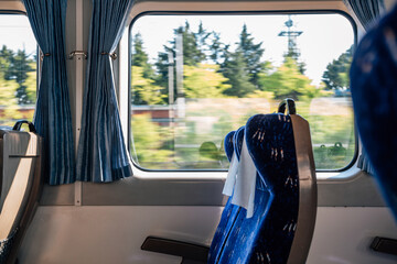 Inside the train, empty seats, nature view over the window in Korea