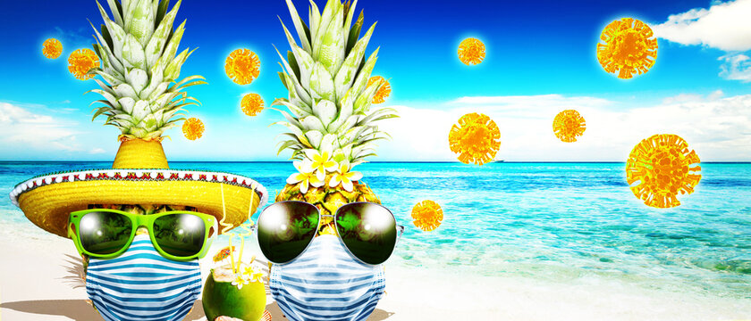 Two pineapples with corona virus mask on vacation