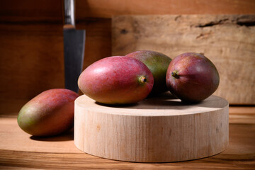 Fresh palmer mango on wooden background, Tropical fruit - obrazy, fototapety, plakaty