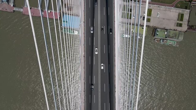 Drone aerial view of bridge and traffic in Shanghai downtown area. Economy traffic transportation and travel concept b-roll footage in Shanghai China. No people view, top bottom view drone footage