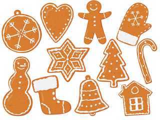 A set of gingerbread figures. Christmas cookies. Brown gingerbread with a white pattern.
