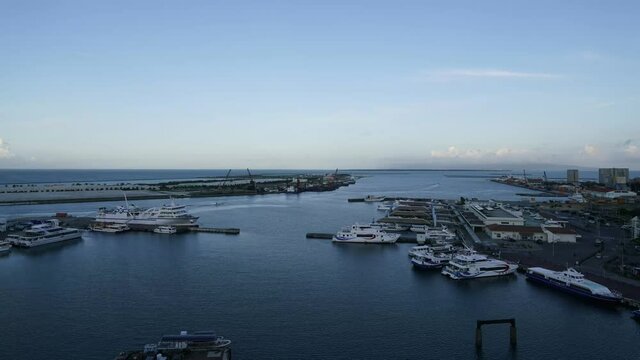 Okinawa,Japan - May 24, 2021: Time-lapse of Ishigaki port, Okinawa, Japan, in the morning around 7AM
