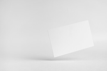 front view of white business card on white