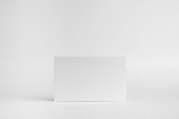 front view of white business card on white