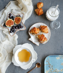 Light snacks for between meals / Mini Croissant and Tea / It goes well with mushrooms and cheese  fillings. Fresh fruits like figs and black grapes as sweet treats