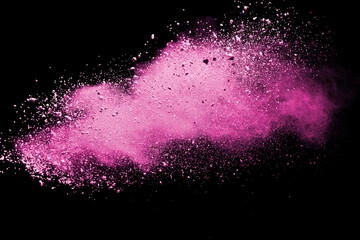 Pink powder explosion isolated on black background