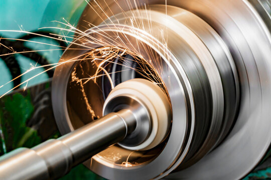 Metal grinding, internal grinding with an abrasive wheel on a high-speed spindle of a circular grinding machine.
