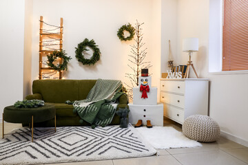 Interior of stylish living room with decorative snowman