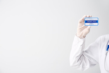 Doctor with International Certificate of Vaccination on grey background