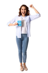 Happy young woman with immune passport on white background