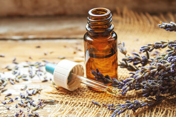 Lavender essential oil in a small bottle.selective focus.