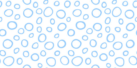 Spotty abstract vector seamless pattern. Random rings, dots, circles, spots, stains, bubbles, stones. Design for fabric, funny cute print. Irregular random texture. Repetitive graphic background