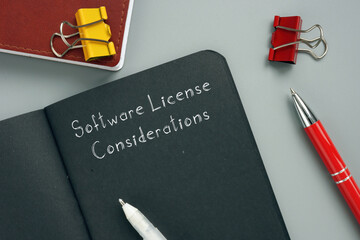  Juridical concept about Software License Considerations with sign on the piece of paper.