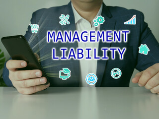  MANAGEMENT LIABILITY phrase on the screen. Broker use cell technologies at office.