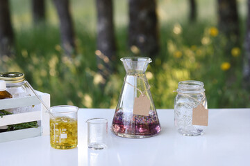 Naturopathic laboratory work table with objects in the forest