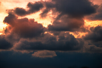 The blurred abstract background of the morning sun exposure to the tiny dust particles that surround the tall buildings in the capital, the long-term health issue of pollution.