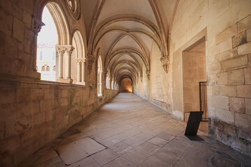 Archway of an old monastery. Cloisters of Batalha Monastery. Batalha Portugal,