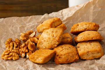 Baked small cheese cookies heap close up