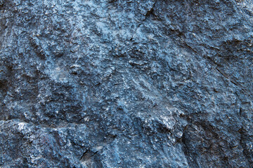 Dark grey stone background or texture.