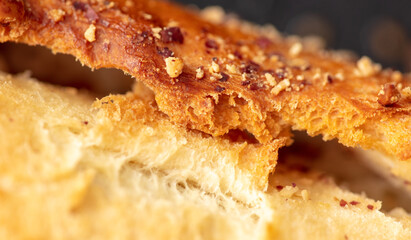 Ruddy crust on a sweet bun as a background.