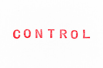 Red color rubber stamp in word control on white paper background