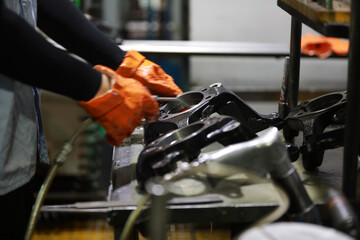 Workers work hard on the production line of automobile safety system