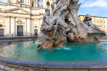 Fototapeta na wymiar 17th century Fountain of the Four Rivers located in Piazza Navona, Rome, Italy