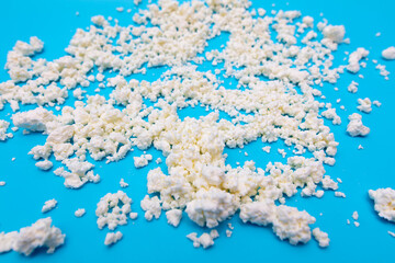 Milk curd on a blue background.