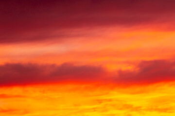 Colorful sunset with clouds in the sky.