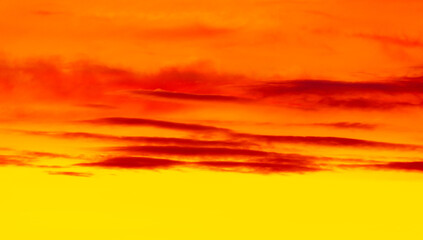 Colorful sunset with clouds in the sky.