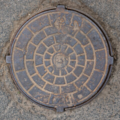 manhole cover in the street