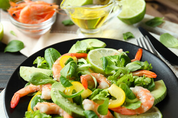 Concept of tasty eating with shrimp salad, close up
