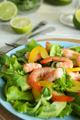 Concept of tasty eating with shrimp salad, close up