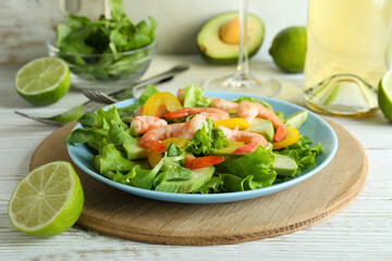 Concept of tasty eating with shrimp salad, close up