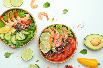 Concept of tasty eating with shrimp salads on white background