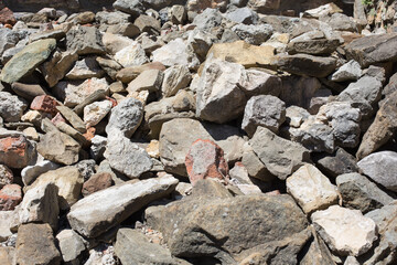 Recycling of old stones, brick stones and building material gained from demolition sites to prepare new construction material