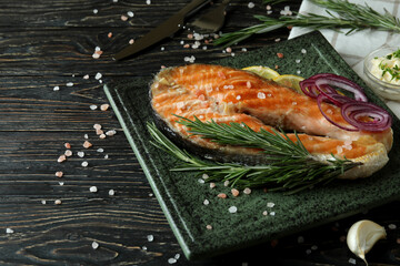 Concept of tasty eating with grilled salmon, space for text