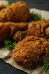 Concept of tasty eating with fried chicken, close up
