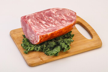 Beef ham piece over board