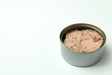 Tin with canned tuna on white background