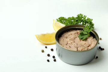 Tin with canned tuna on white background
