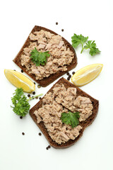 Sandwiches with canned tuna on white background