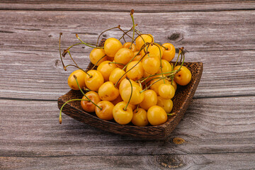 Sweet ripe yellow cherry heap